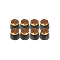 Eight gold and black ridged control knobs with a black indicator line on top, arranged in two rows of four each.