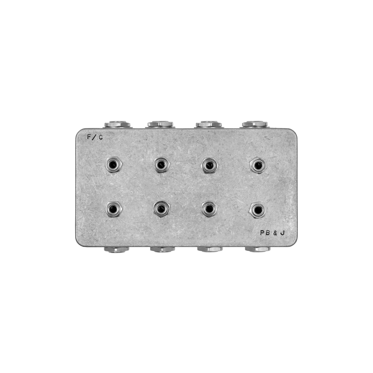 Metallic compact patchbay with eight audio jack sockets arranged in two rows.