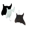 Four guitar pickguards with 11 holes in black, white, pearloid, and tortoiseshell finishes.