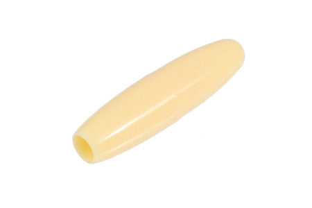 Single cream-colored plastic tip with a hollow cylindrical opening is shown on a white background.
