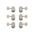 Set of six vintage-style silver guitar tuners with white round buttons and engraved branding.
