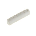 White slotted guitar nut with six evenly spaced slots shown against a white background.