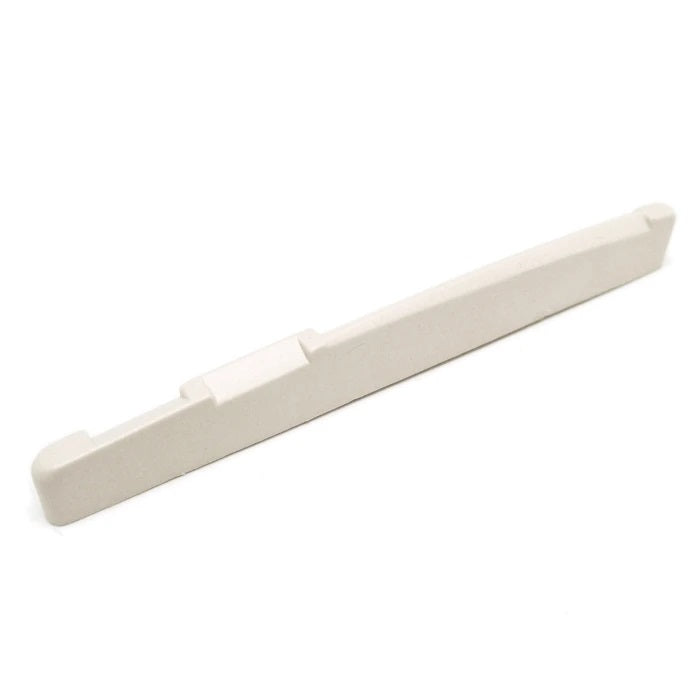 Off-white synthetic guitar saddle with compensated notches shown on a white background.