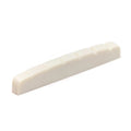 White slotted guitar nut with a flat bottom and six slots visible from an angled view.