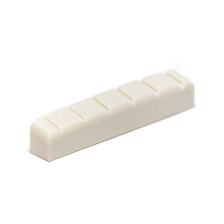 Off-white slotted nut with six slots for string spacing or alignment, shown on a white background.