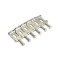 Six metal guitar bridge saddles with screws arranged in a row on a white background.