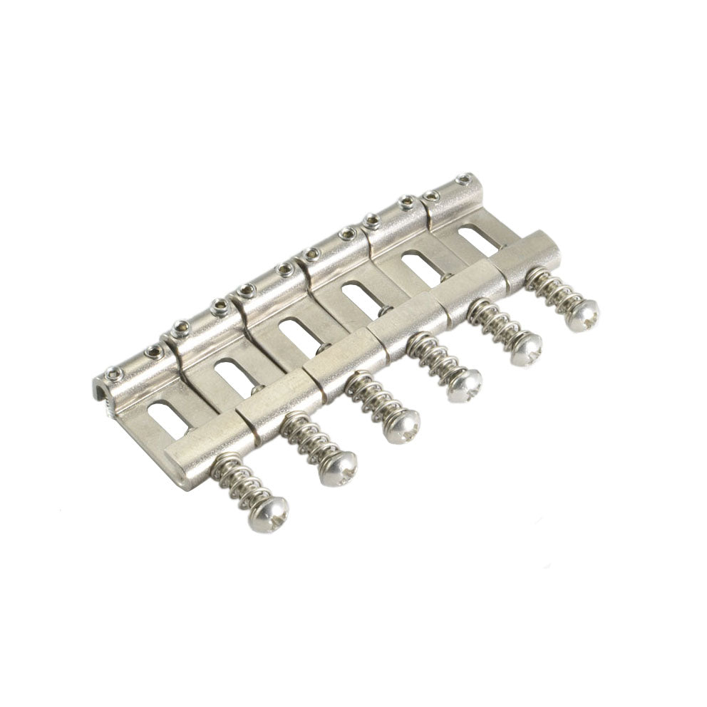Six metal guitar bridge saddles with screws arranged in a row on a white background.