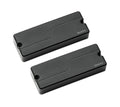 Two black rectangular soapbar pickups with screw holes labeled Fishman.