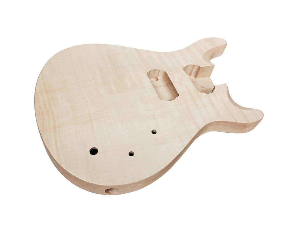 Unfinished natural wood guitar body with routed cavities and smooth edges.