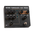 Black modulation pedal with multiple control knobs and a footswitch labeled Wind Through The Trees.