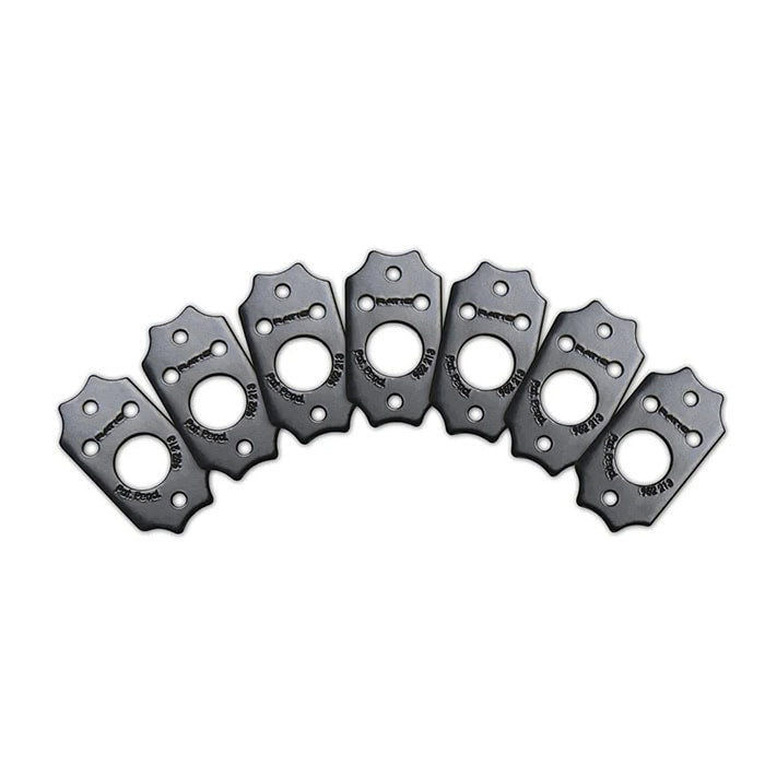 Six black plastic mounting plates with two screw holes and a central circular opening, arranged in a fan shape.