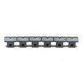 Six black metal saddles for guitar bridge arranged in a straight line on a white background.