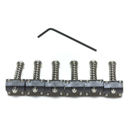 Six black metal barrel saddles in a row with an allen wrench above them on a white background.