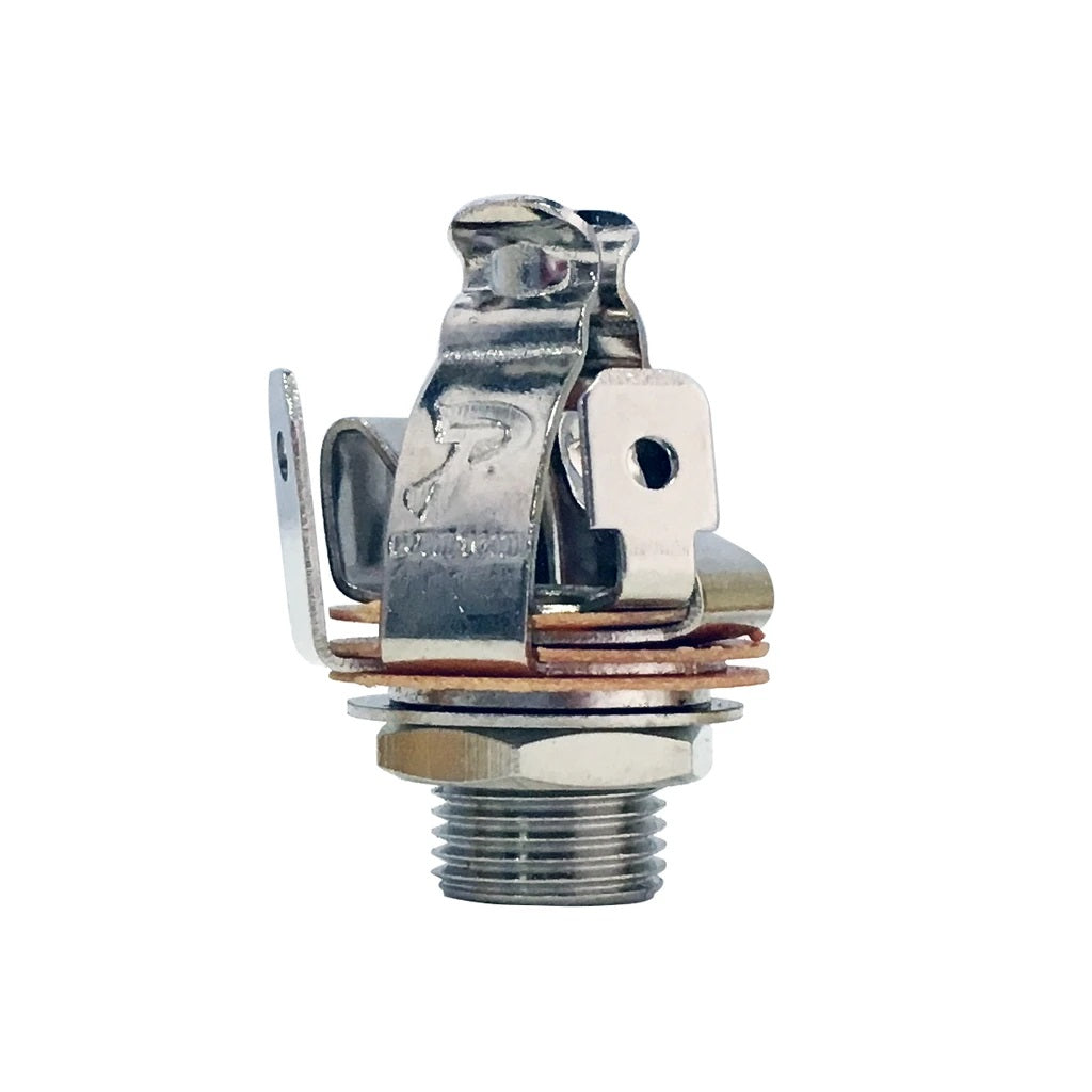 Close-up view of a metal nickel 1/4 inch stereo jack socket with multiple contacts and a threaded mount.