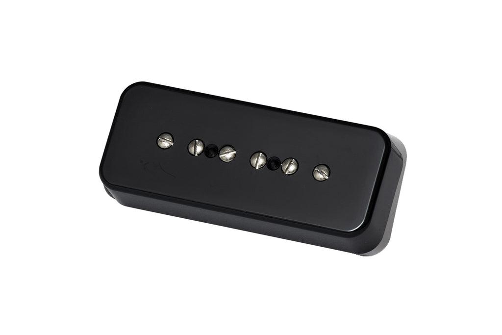 Black rectangular guitar pickup with six metal screw poles in two rows on top surface.