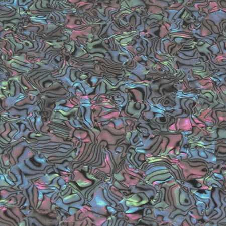 Close-up view of a multi-colored iridescent abalone patterned surface.