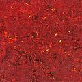 Close-up image of a red vintage tortoise patterned material with a swirling design texture.