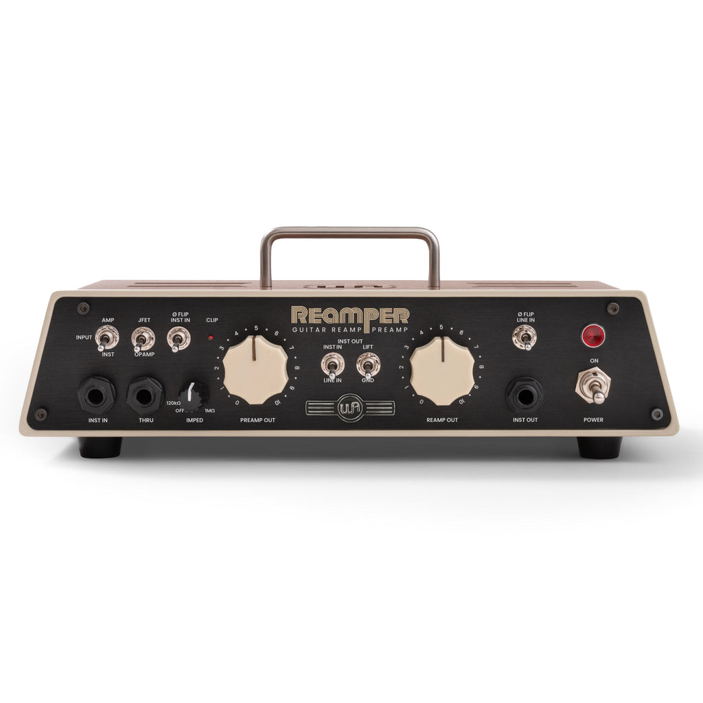 Front panel of a Warm Audio Reamper unit with knobs, toggle switches, and multiple 1/4 inch audio jacks.
