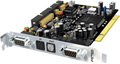 Close-up of a black PCI card with silver bracket featuring dual 9-pin D-sub connectors and optical input and output ports.
