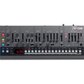 Front view of a Roland JX-08 synthesizer module with numerous knobs, sliders, buttons, and a digital display.