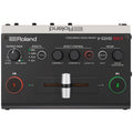 Top view of a Roland V-02HD MK II streaming video mixer showing controls and labeled buttons.