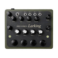 Black and olive green synthesizer with knobs, buttons, and 1/4 inch jacks labeled with various sound control parameters.