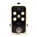 White guitar effects pedal with black faceplate labeled Pearl featuring four control knobs, a toggle switch, and a footswitch.