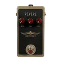 Rectangular guitar effects pedal with three red knobs labeled Drive, Tone, Level and a footswitch below.