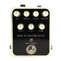 White and black guitar effects pedal with seven control knobs and one footswitch labeled Sound Destruction Device (Recovery).