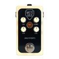Rectangular guitar effects pedal with four knobs, an amber indicator light, and a footswitch on a cream and black face.
