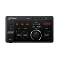 Black Roland E-4 device with sliders, buttons, knobs, headphone jack, and digital display showing 128.0