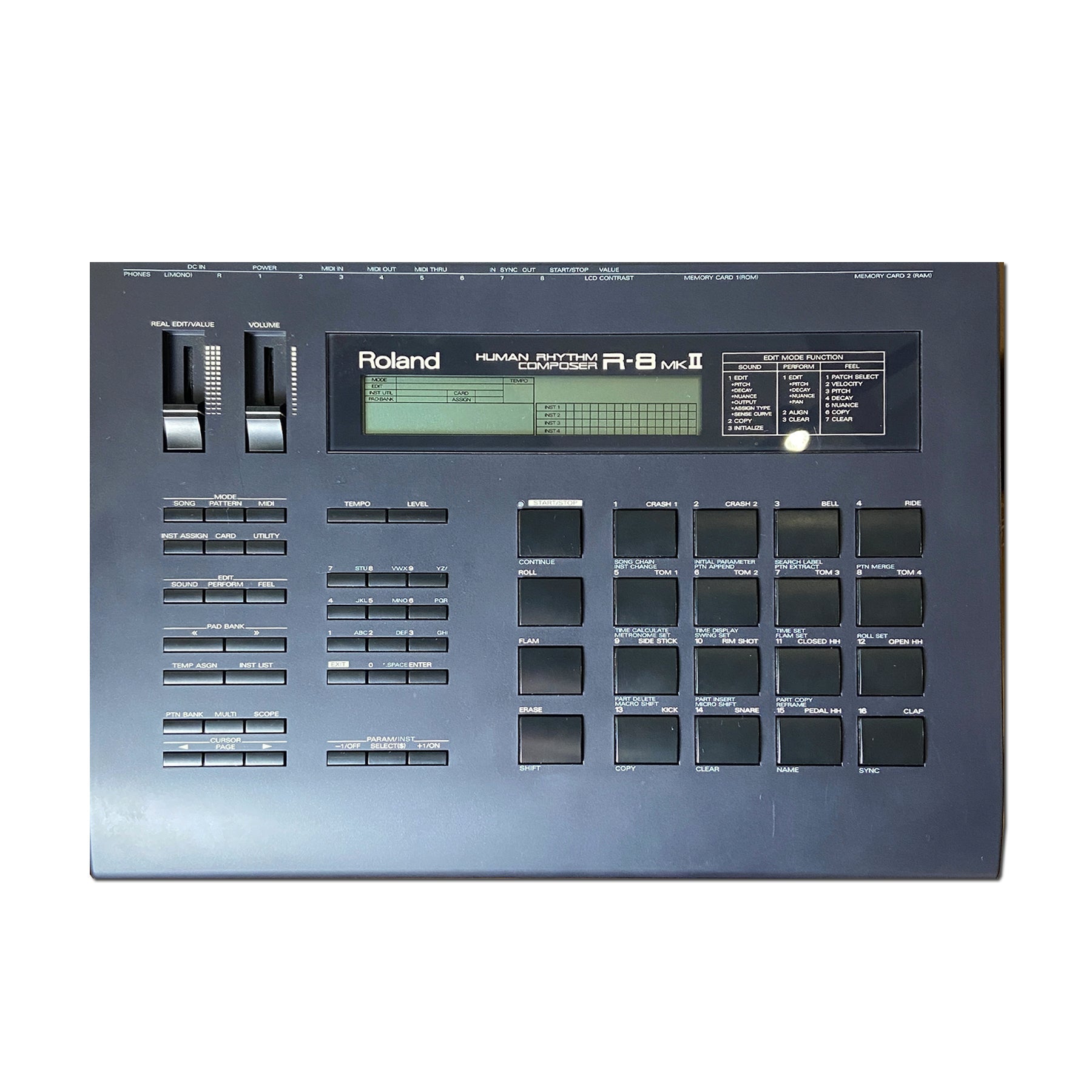 Top view of a black Roland Human Rhythm Composer R-8 MKII electronic drum machine with buttons, sliders, and a screen.