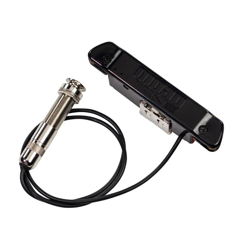 Black rectangular guitar soundhole pickup with attached cable and silver 1/4 inch jack plug.