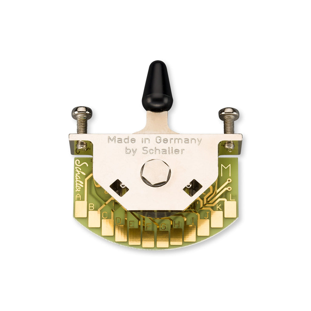 Green circuit board with metal toggle switch and gold contact pads labeled A to M