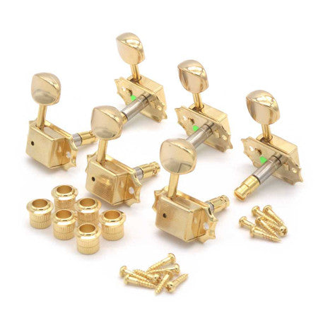 Set of six gold guitar tuning pegs with washers and screws arranged on a white background.