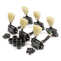 Set of six black guitar tuning pegs with cream tuning buttons and included screws and bushings.