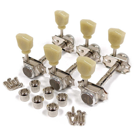 Set of six nickel guitar tuners with cream tuning knobs, screws, and bushings arranged on a white surface.