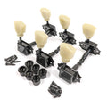 Set of six black tuning machines with ivory knobs, screws, and bushings for string instruments.
