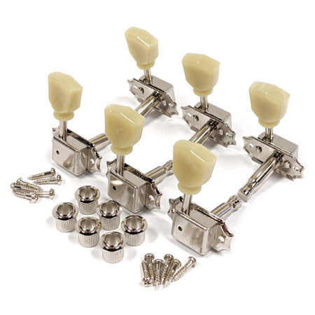 Set of six metal guitar tuning pegs with cream plastic knobs, screws, and bushings on a white background.