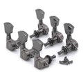 Set of six metal guitar tuning pegs in black finish with accompanying screws on white background.