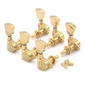 Set of six gold guitar tuning machines with mounting screws on a white background.