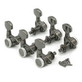 Set of six metallic locking guitar tuners with rotary knobs and mounting screws on a white background.