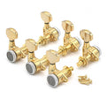 Set of six gold guitar locking tuners with mounting screws arranged on a white background.