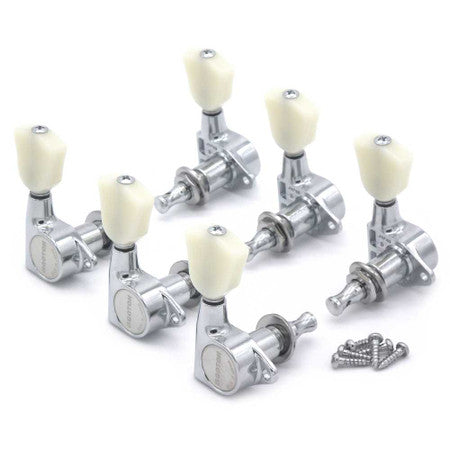 Six chrome guitar tuning pegs with off-white buttons and six mounting screws arranged on a white background.