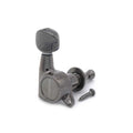 Single black metal guitar tuning machine with attached mounting screw on white background.