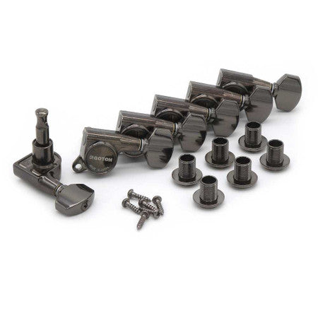 Set of six black guitar tuning pegs with bushings and screws on a white background.
