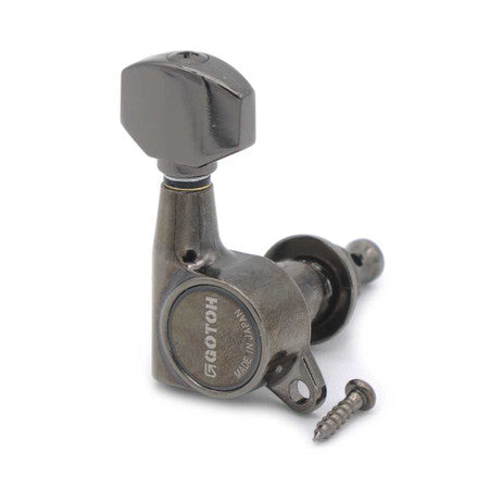 Individual metallic gray guitar tuning peg with black tuning key and screw included