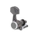 Single black locking guitar tuner with silver accents and included mounting screw on white background.