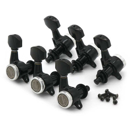 Set of six black guitar locking tuners with silver circular knobs and six black screws on white background
