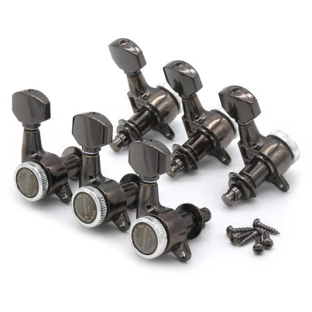 Six black metal guitar tuners with screws arranged on a white background.